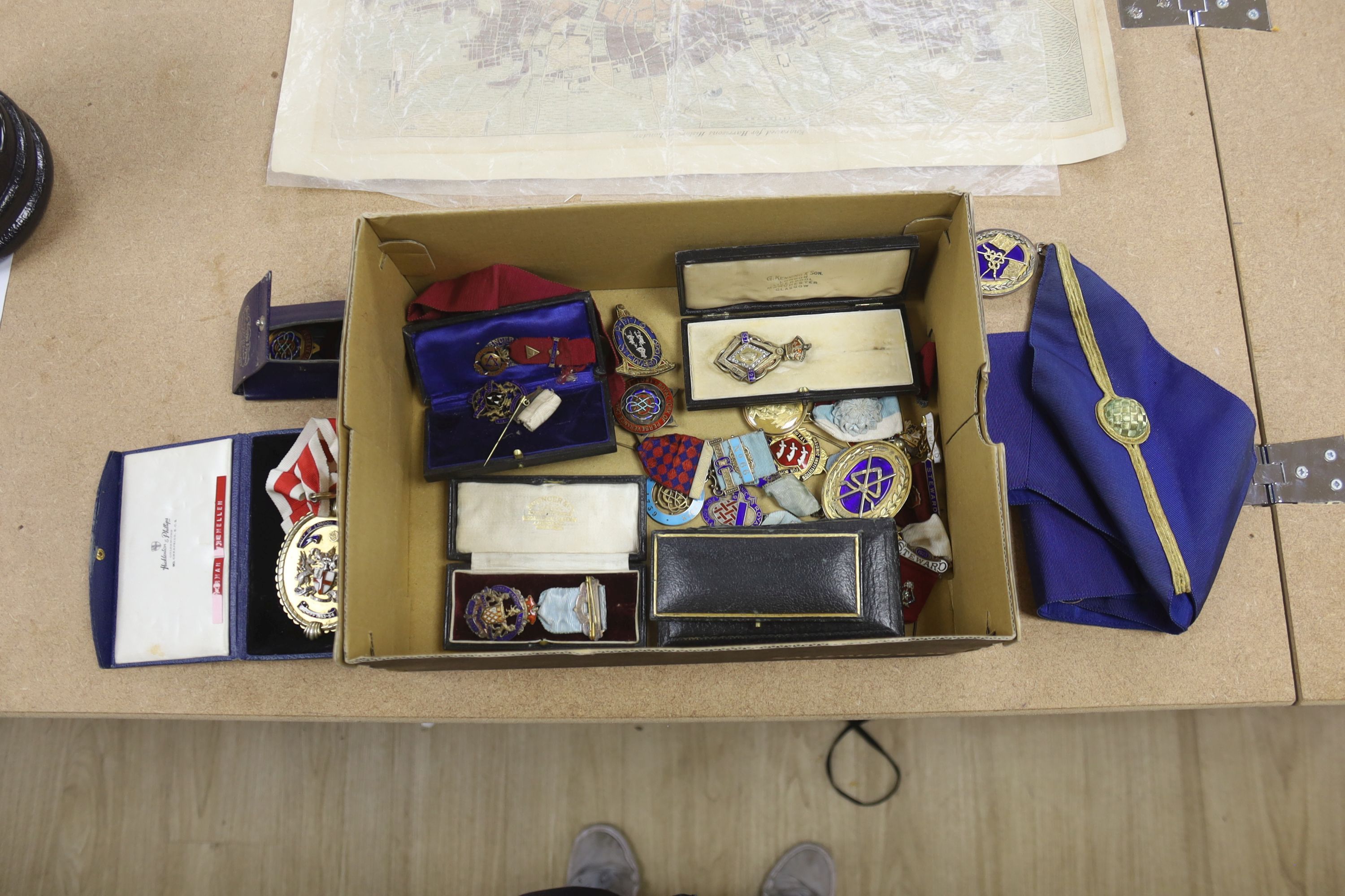 Twenty two silver gilt and enamelled Masonic medallions